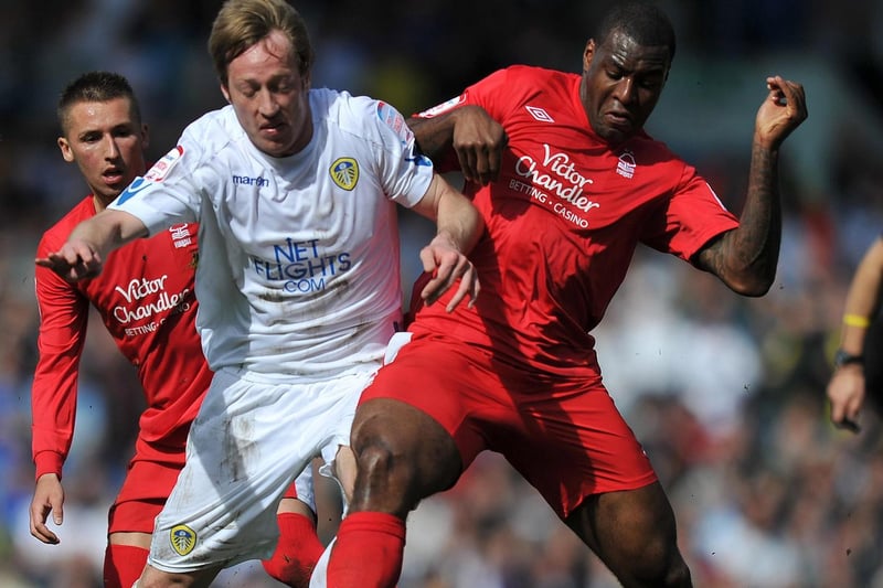 Luciano Becchio battles for the ball with Nottingham Forest's Wes Morgan.
