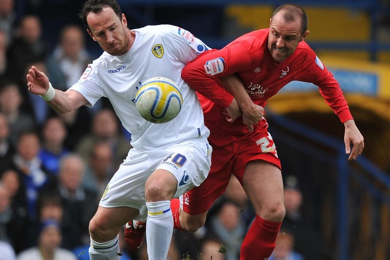 Andy O'Brien and Nottingham Forest's Kris Boyd go toe to toe.