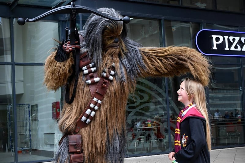 Star Wars character Chewbacca meets a fan