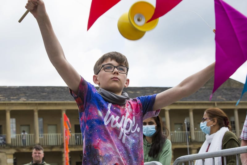 Daniel Perry, 12, tries his hand at throwing a diabolo.