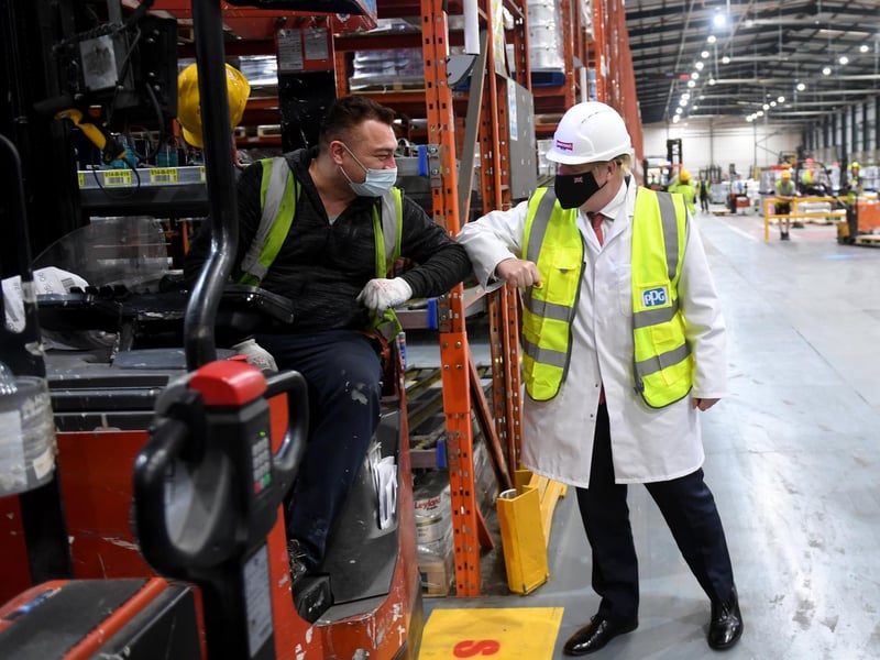 Prime Minister Boris Johnson pictured during his visit to PPG Architectural Coatings, Huddersfield Road, Birstall