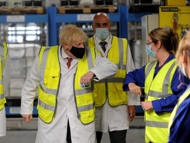 Prime Minister Boris Johnson pictured during his visit to PPG Architectural Coatings, Huddersfield Road, Birstall