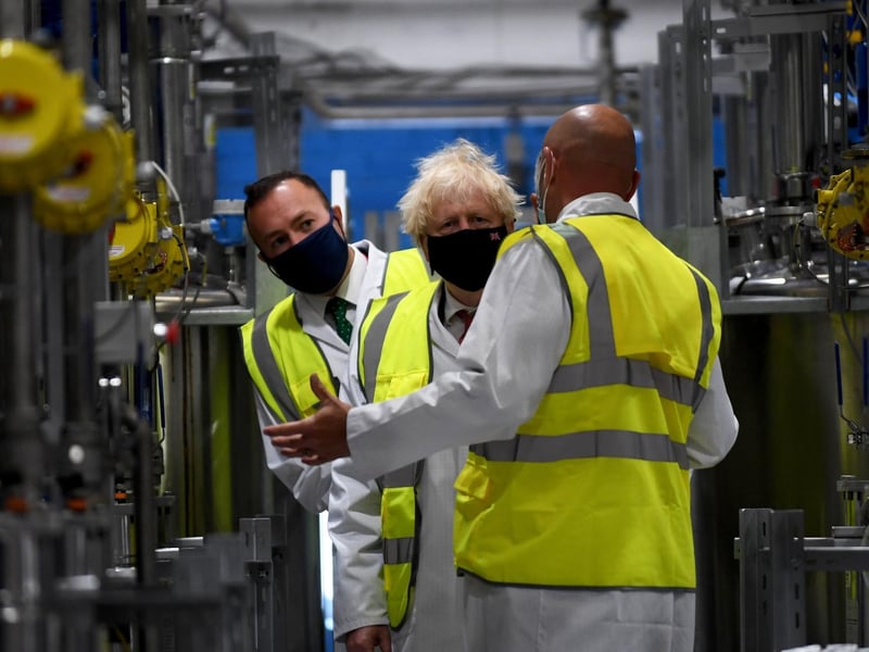 Prime Minister Boris Johnson pictured during his visit to PPG Architectural Coatings, Huddersfield Road, Birstall