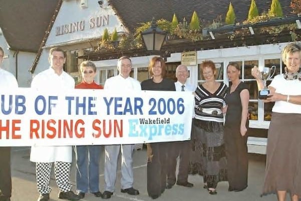 Maureen Madeley with the trophy and her staff at Castleford's Rising Sun after winning the Express Pub of Year in 2007.