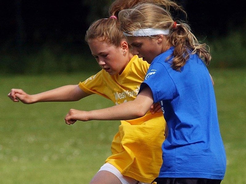 Leeds's Shauna Hill (right) battles for the ball with Bradford's Natalie Mannion.