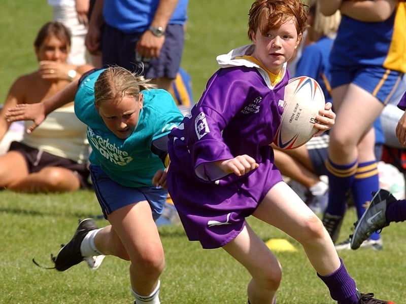 Bradford player Kareena Brooke evades a challenge from a Calderdale player.