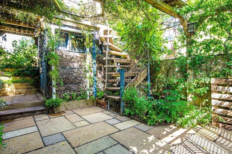The handmade construction in the back garden of his home on Spring House Road, Crookes, complete with a living roof terrace and a hedgehog abode, shows what can be achieved when space is limited.