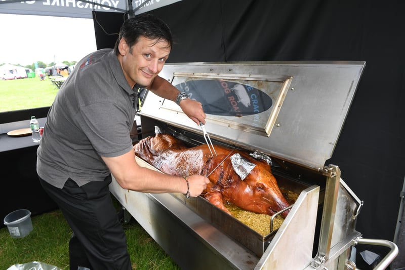 26th June 2021
Harrogate Food and Drink Festival.
Pictured Phil Maddison carving his 80kilo hog roast on the Yorkshire Crackling Hog Roast stall
Picture Gerard Binks