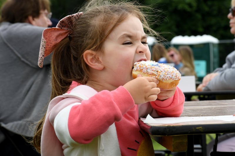 26th June 2021
Harrogate Food and Drink Festival.
Pictured Elia Wood aged 4 gets stuck into a giant donut
Picture Gerard Binks