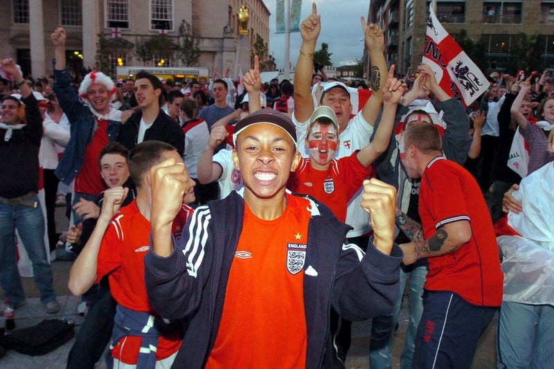 An England supporter celebrates in Mlilennium Square after England scored their fourth goal against Croatia. The game finished 4-2.