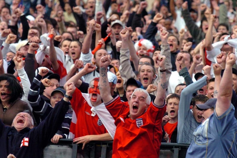 The Millennium Square crowd celebrate as England score their first goal against Croatia.