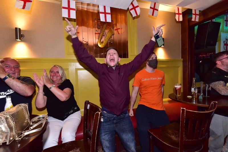 Bar 2 B fans react to England's opening goal.