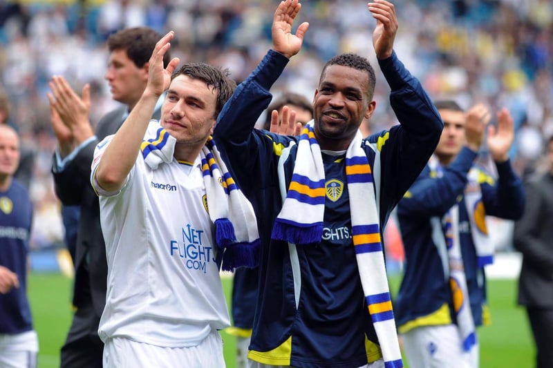 Robert Snodgrass and Rui Marques are pictured during their lap of honour after the final whistle.
