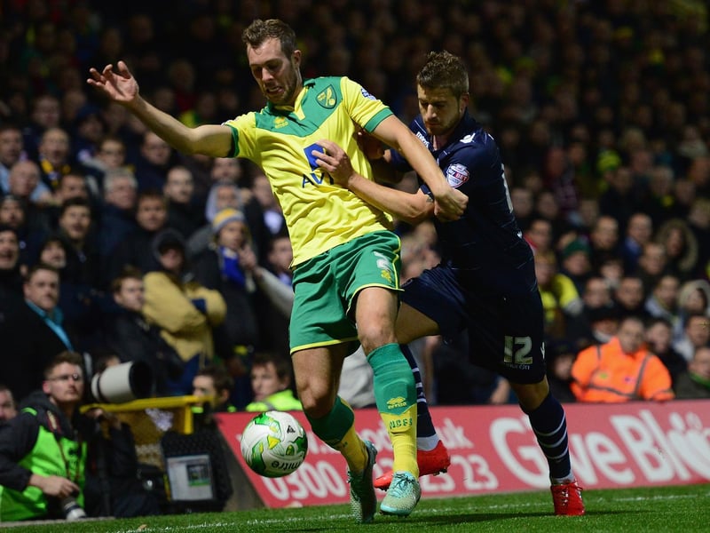 Gaetano Berardi battles with Norwich City's Steven Whittaker during the Championship clash at Carrow Road in October 2014.
