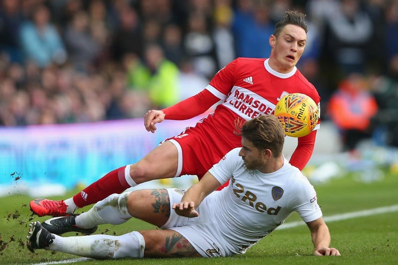 Gaetano Berardi slides in on Middlesbrough's Connor Roberts during the Championship clash at Elland Road in November 2017.