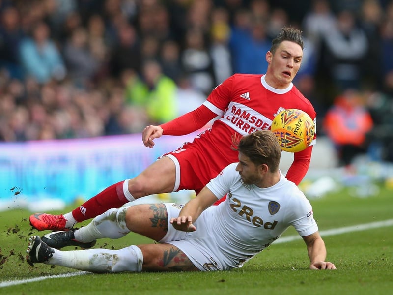 Gaetano Berardi slides in on Middlesbrough's Connor Roberts during the Championship clash at Elland Road in November 2017.