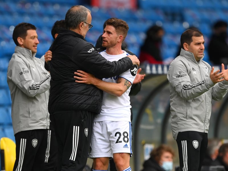 Gaetano Berardi is embraced by manager Marcelo Bielsa after he leaves the pitch after his last match for Leeds United during the Premier League clash against West Bromwich Albion at Elland Road in May 2021.