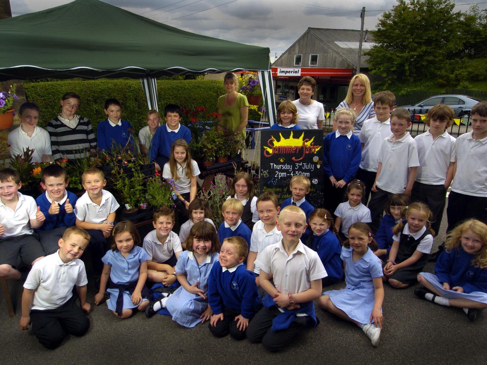 Castleton Primary School staff and pupils prepare for their summer fair.