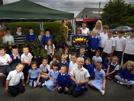 Castleton Primary School staff and pupils prepare for their summer fair.
