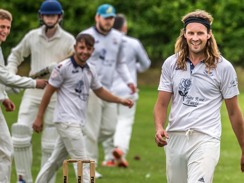 Mark Estill, foreground, took two wickets for the home side

Photo by Brian Murfield
