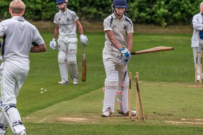 A Seamer 2nds batsman looks back at his stumps after falling to Taylor Humble