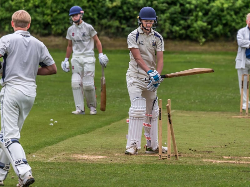 A Seamer 2nds batsman looks back at his stumps after falling to Taylor Humble