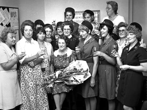District Nurse Sister Lee retires and is pictured with her colleagues for a farewell toast in 1976