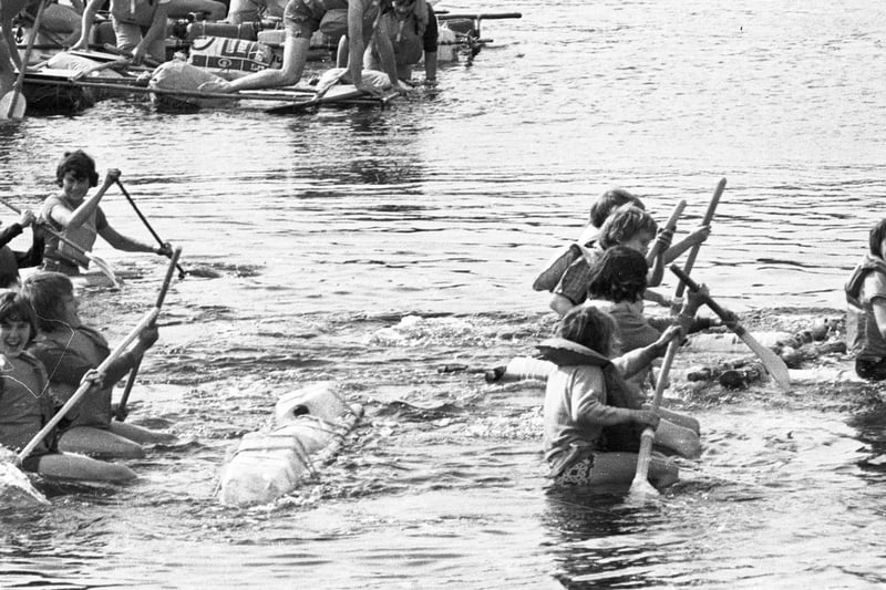 Orrell reservoir during the summer of 1976 with a scouts raft race in progress