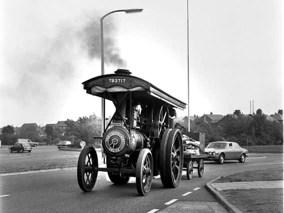 A steam traction engine makes its way through Marus Bridge in 1976