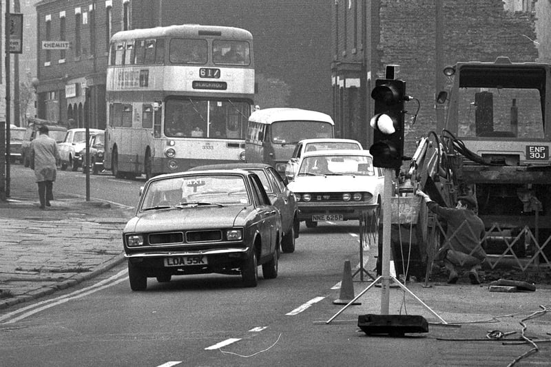 Roadworks and traffic in Whelley, Wigan, during the summer of 1976