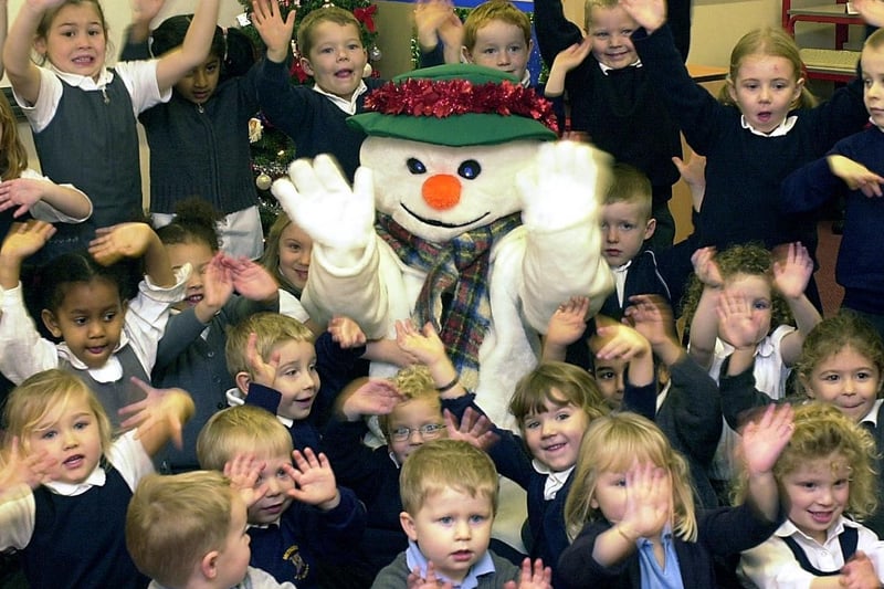 Snowman (aka Reception teacher Mrs.Donna Clark) with pupils from the Reception Class and Nursery in 2004.