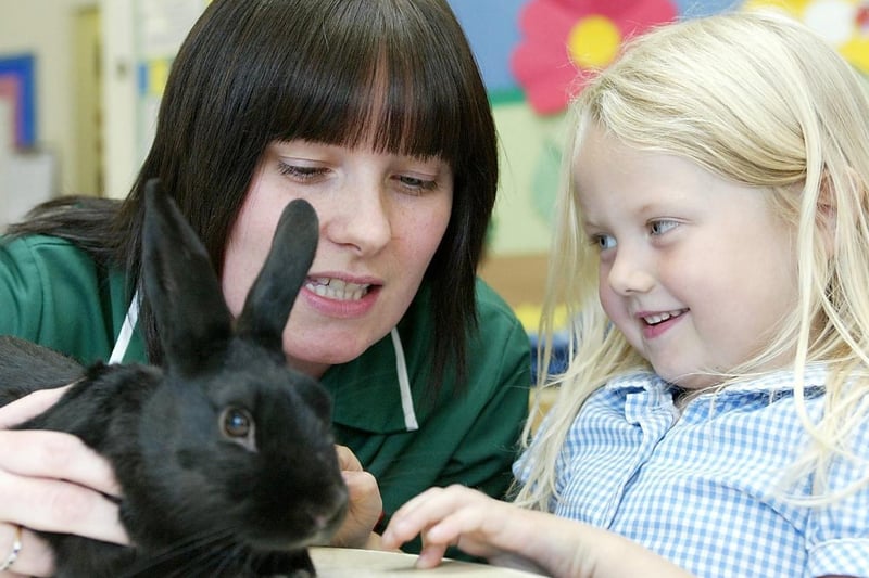 Michelle Northrop-Walker a veterinary nurse took her rabbit, Bovril, to Trinity Nursery, Ossett to help the kids understand how to care for pets. With Olivia in 2005.