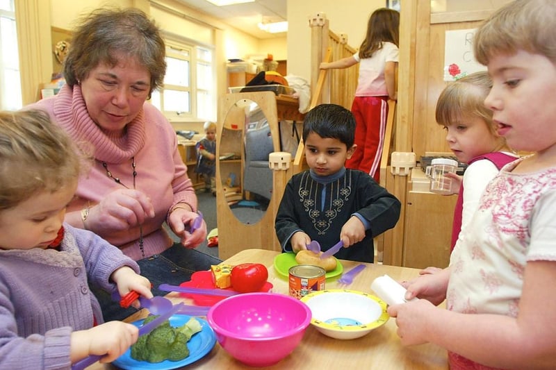 Castle Children's Centre celebrated a good Ofsted report in 2006, playing in the kitchen with Head of nursery Margaret Hague is Joanne , Haroon , Jamielee and Jade.