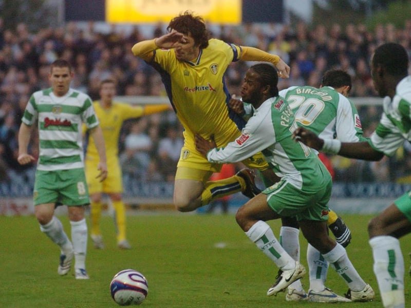 Jonny Douglas is fouled by Yeovil Town's Jamie Peters.