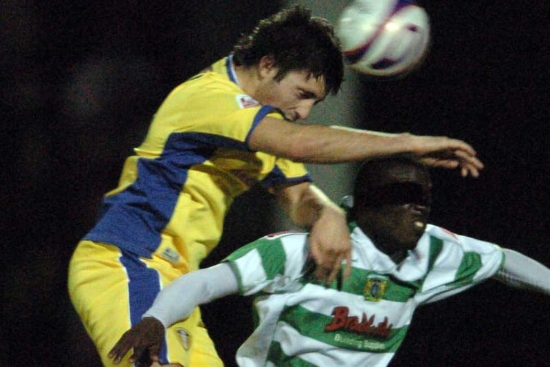 Alan Sheehan out jumps Yeovil Town's Marvin Williams.