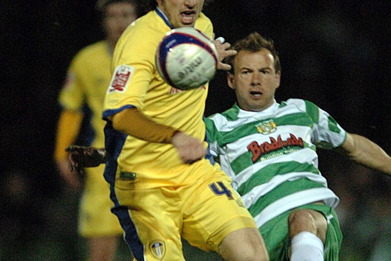Jonny Douglas is challenged by Yeovil Town striker Marcus Stewart.