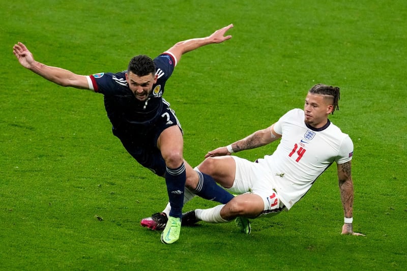 Phillips takes down John McGinn during the goalless draw against Scotland at Wembley.