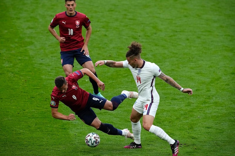 Phillips stands firm as Tomas Holes is sent to ground during the final group stages clash against Czech Republic at Wembley.
