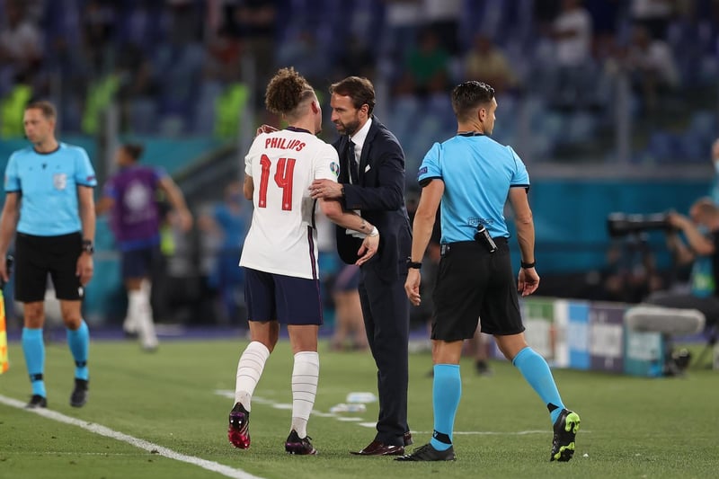 Phillips is embraced by Three Lions boss Gareth Southgate after being taken off in the second half against Ukraine to save the midfielder from the risk of another booking and a one-match ban.