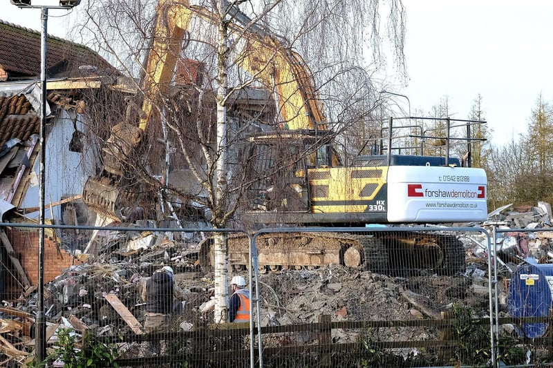 Diggers moved in to demolish Papa's Fish & Chip Restaurant.