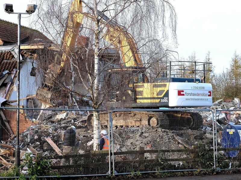 Diggers moved in to demolish Papa's Fish & Chip Restaurant.
