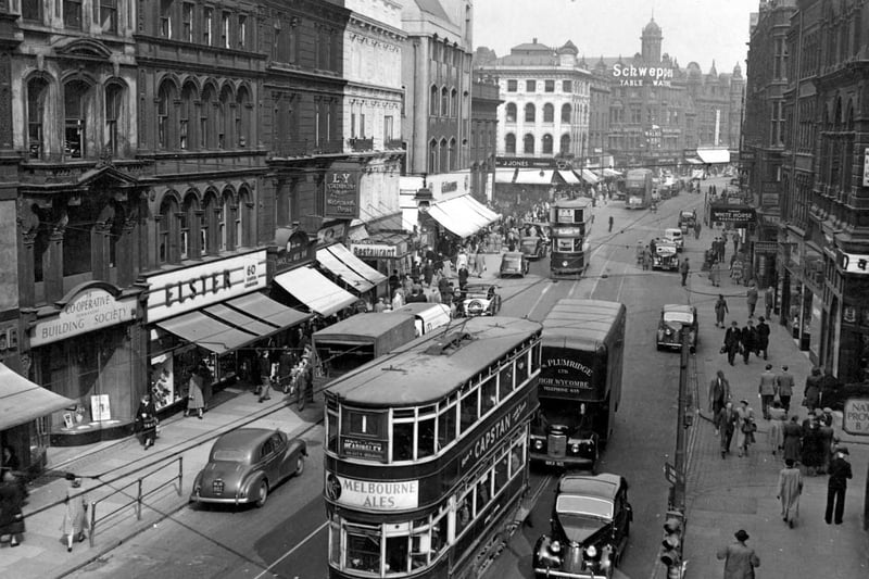 Boar Lane in April 1951 showing shops; Elsters, J. Jones, The National Provincial Bank, the Westminster Bank and the Cooperative Building Society.