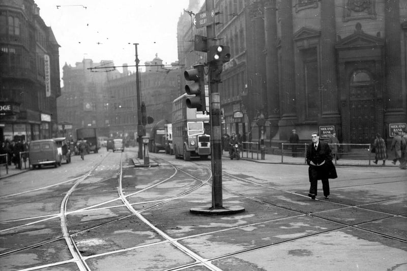 Boar Lane (centre) at the busy junctions with Park Row (left) and Bishopgate Street (right) with junction with Wellington Street behind the camera. This photo dates back to January 1951.