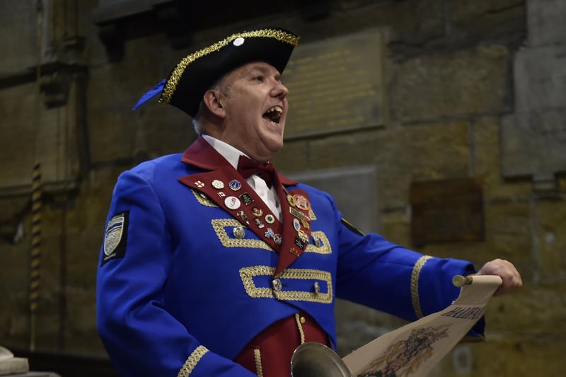 Halifax Town Crier Les Cutts at the service.