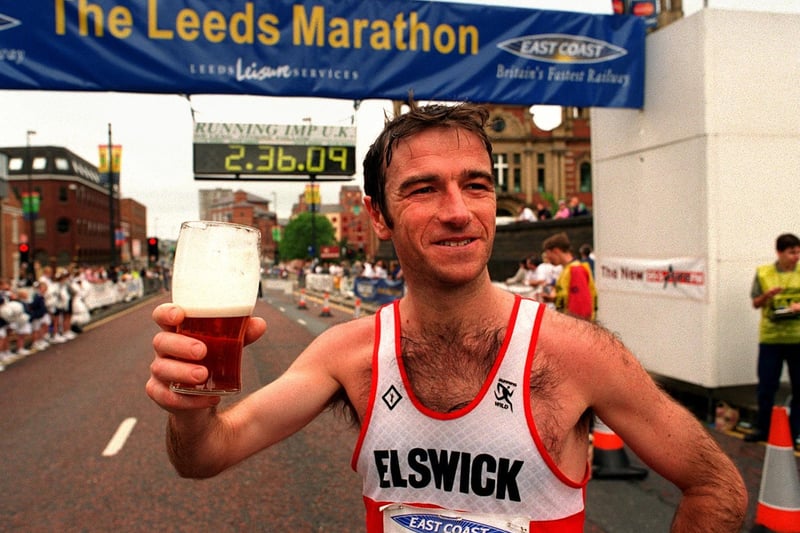 Runner Ieuan Ellis toasts the crowd after winning the 1996 Leeds Marathon.