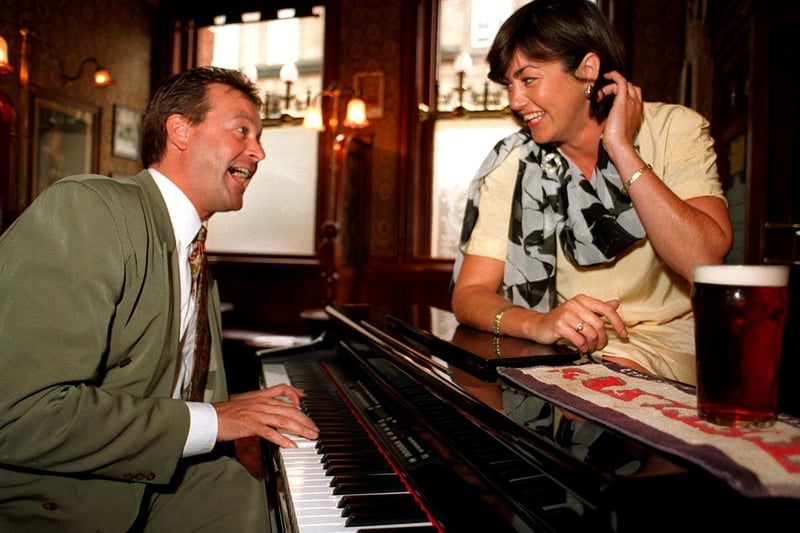 Entertainer Bobby Crushwas in Leeds to promote the Great Universal Pub Piano Competition. He is pictured serenading Tracey Murphy, licencee of The Victoria pub on Great George Street.
