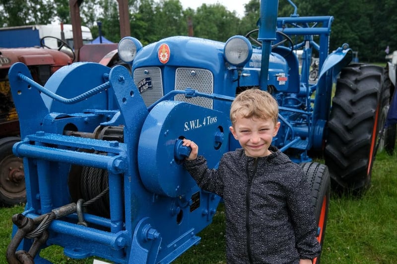 Austin Hollingworth with his favourite tractor at the show