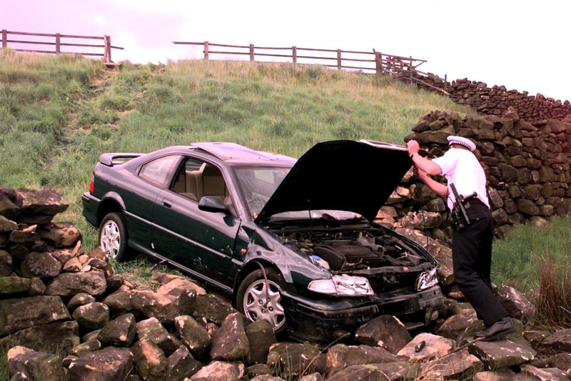 A Rover Coupe crashed through a fence on the top road from Ilkley past the Cow and Calf Rocks heading towards Guiseley in May 1998.