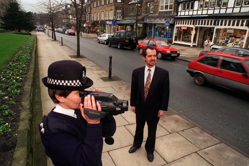 Inspector Alison Bennett uses a new video camera in The Grove watched by jeweller Mike Lynes, who donated it to Ilkley Police.