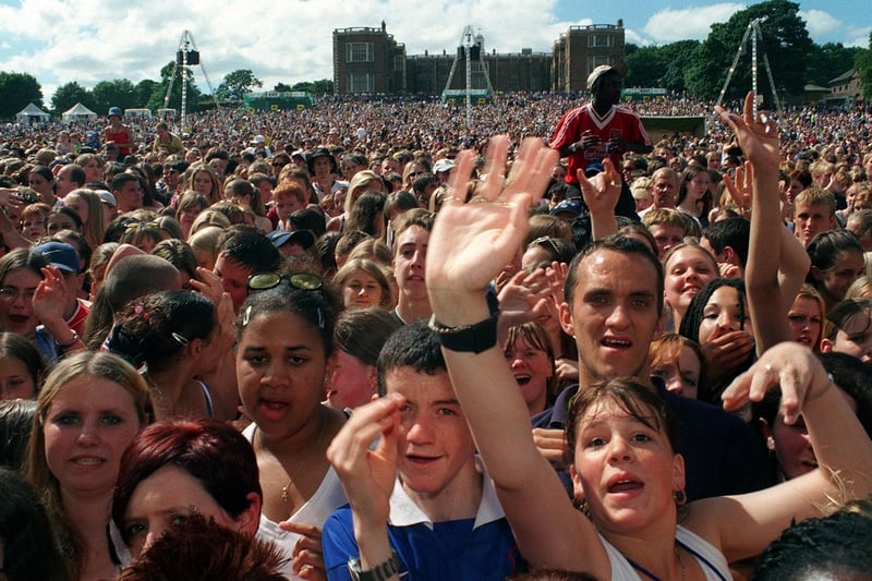 Revellers enjoy the music in July 1999.